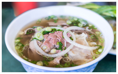 A steaming bowl of pho. 