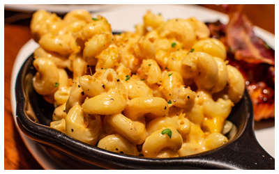 Baked macaroni and cheese in a cast iron pan