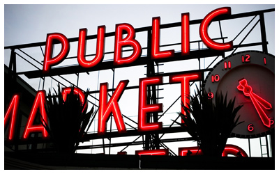 Neon Pike Place Market sign reading Public Market